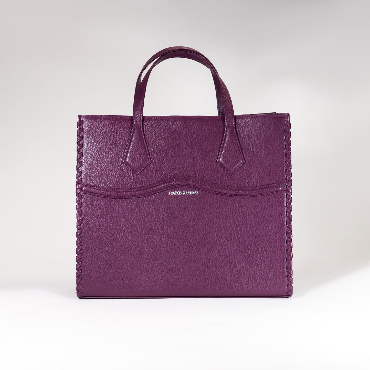 by francis martinez_Bolso Clementina | Cartera de mano en cuero color morado