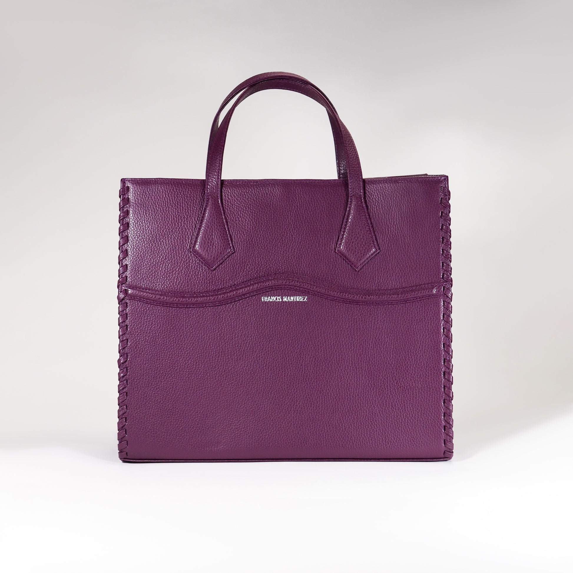 by francis martinez_Bolso Clementina | Cartera de mano en cuero color morado
